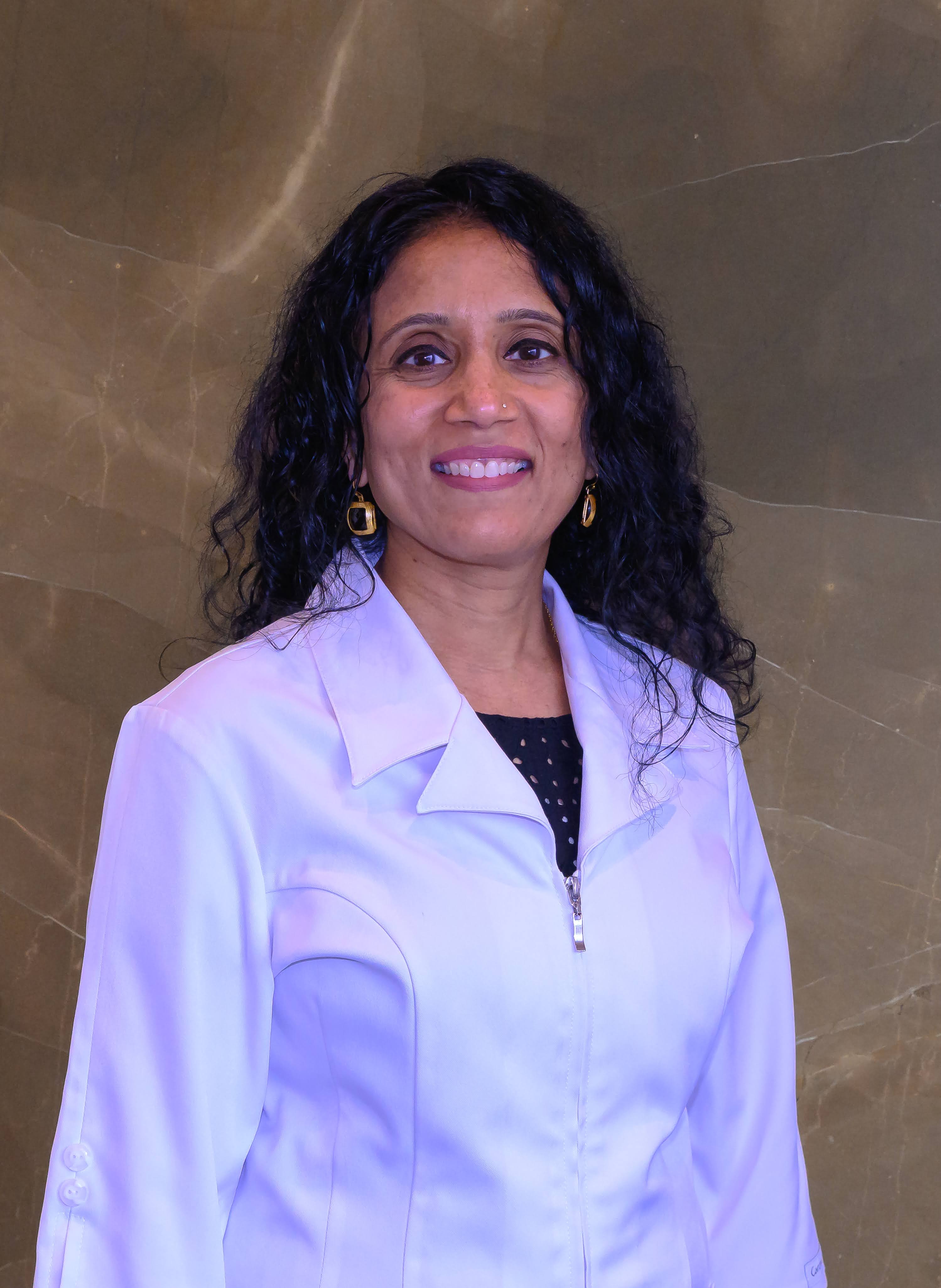 Dr. Kinjal Patel