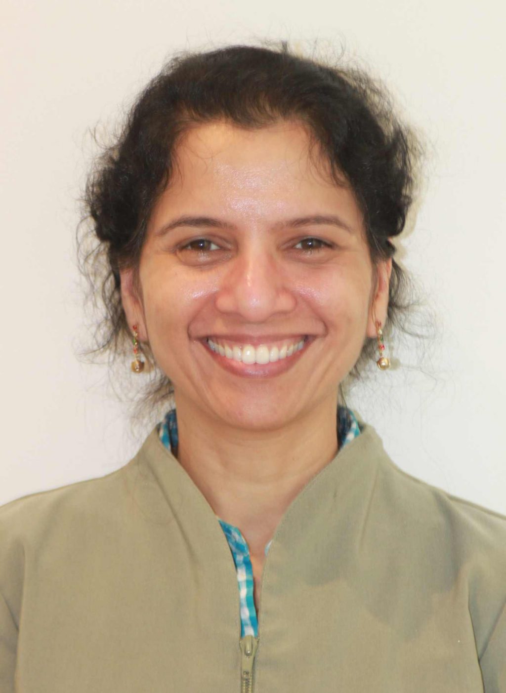 Dr. Tasneem Khan