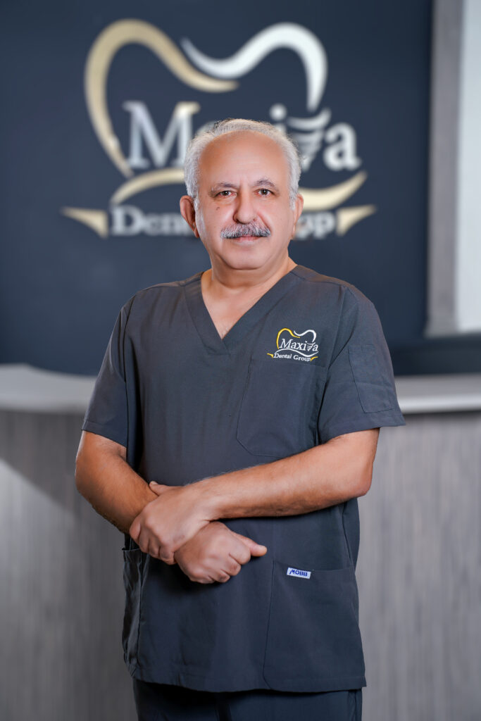 Dr. Behnam Malek