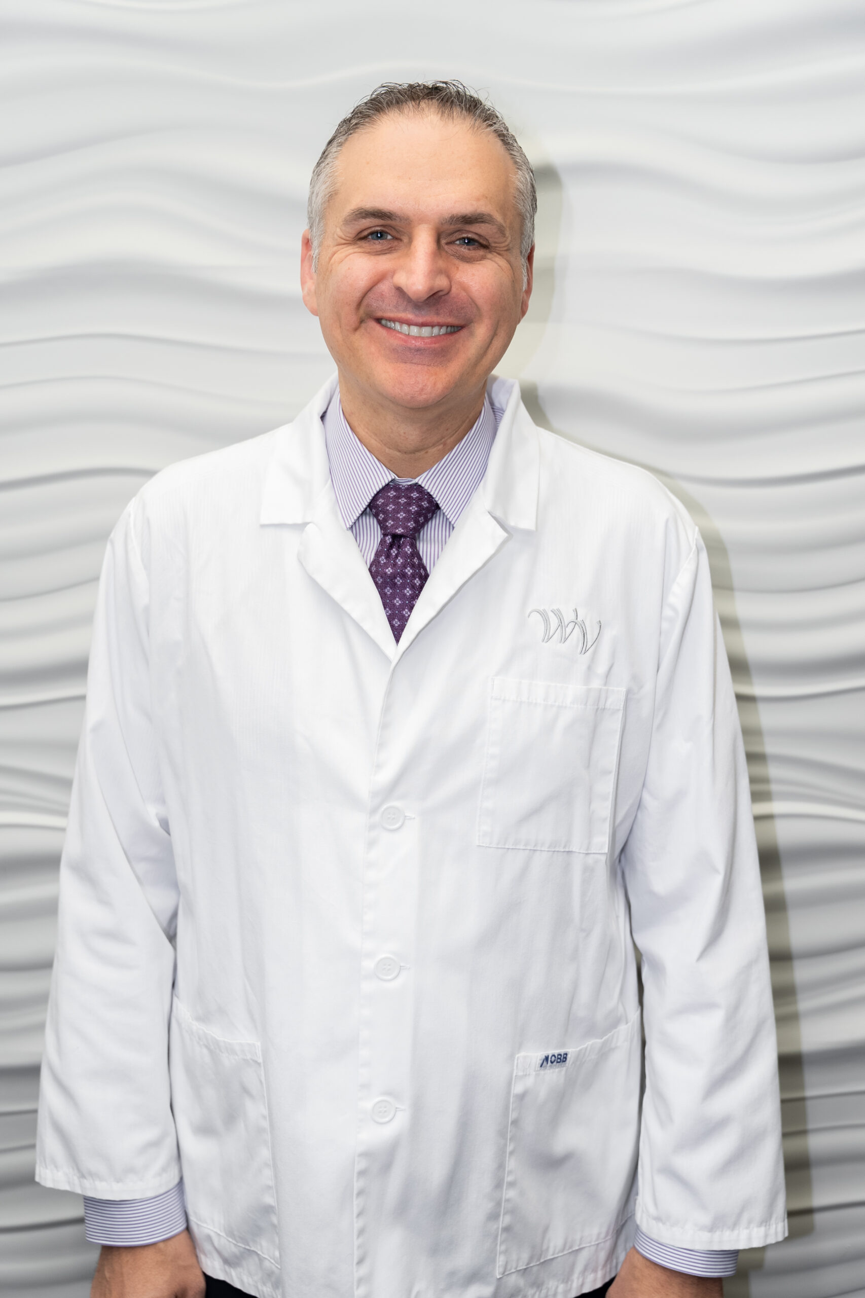 Dr. Charles Triassi